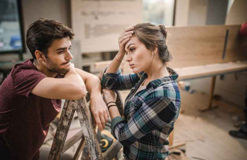 Professional handyman working on complex home repairs